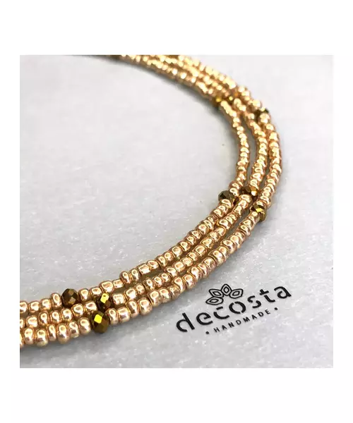 Golden necklace with bronze crystals